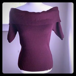 Form fitted off-the-shoulder sweater!